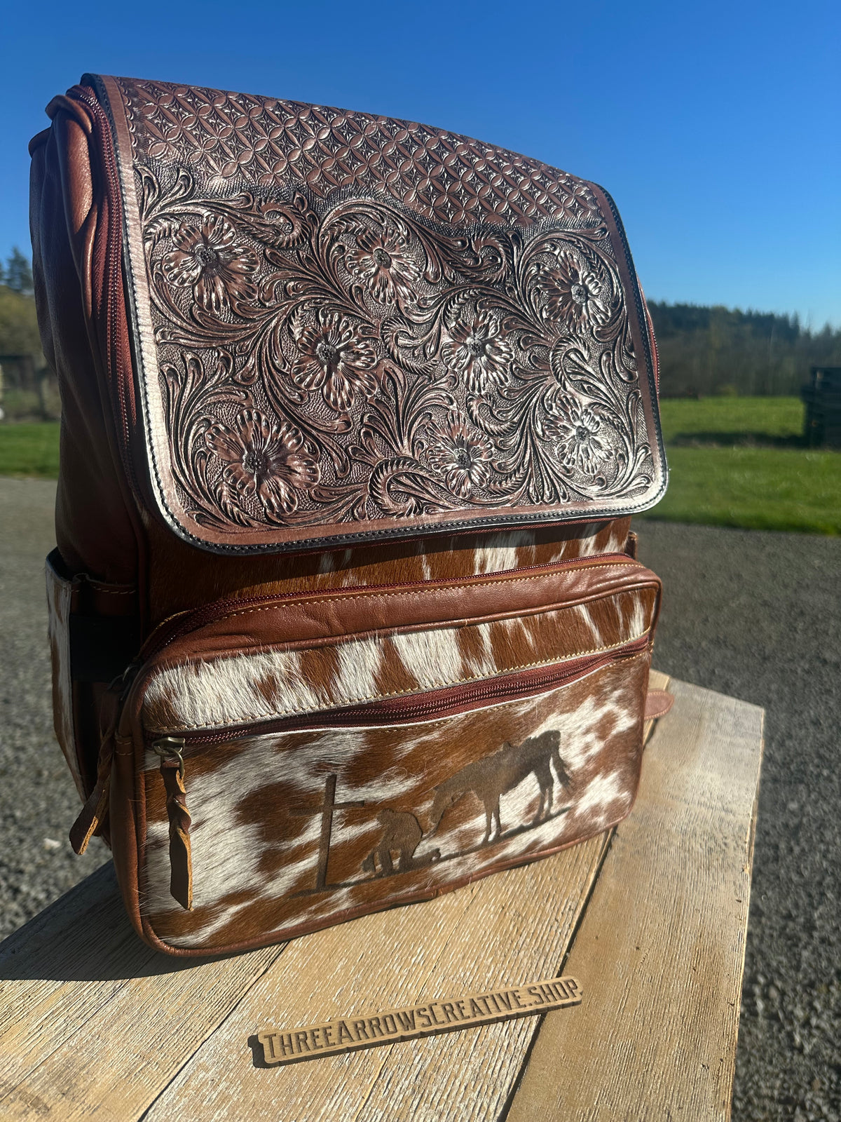 Leather and Cowhide Backpack with Praying Cowboy