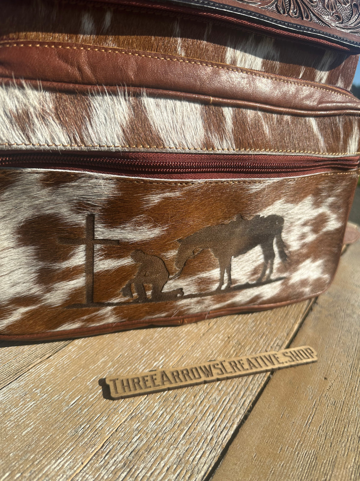 Leather and Cowhide Backpack with Praying Cowboy