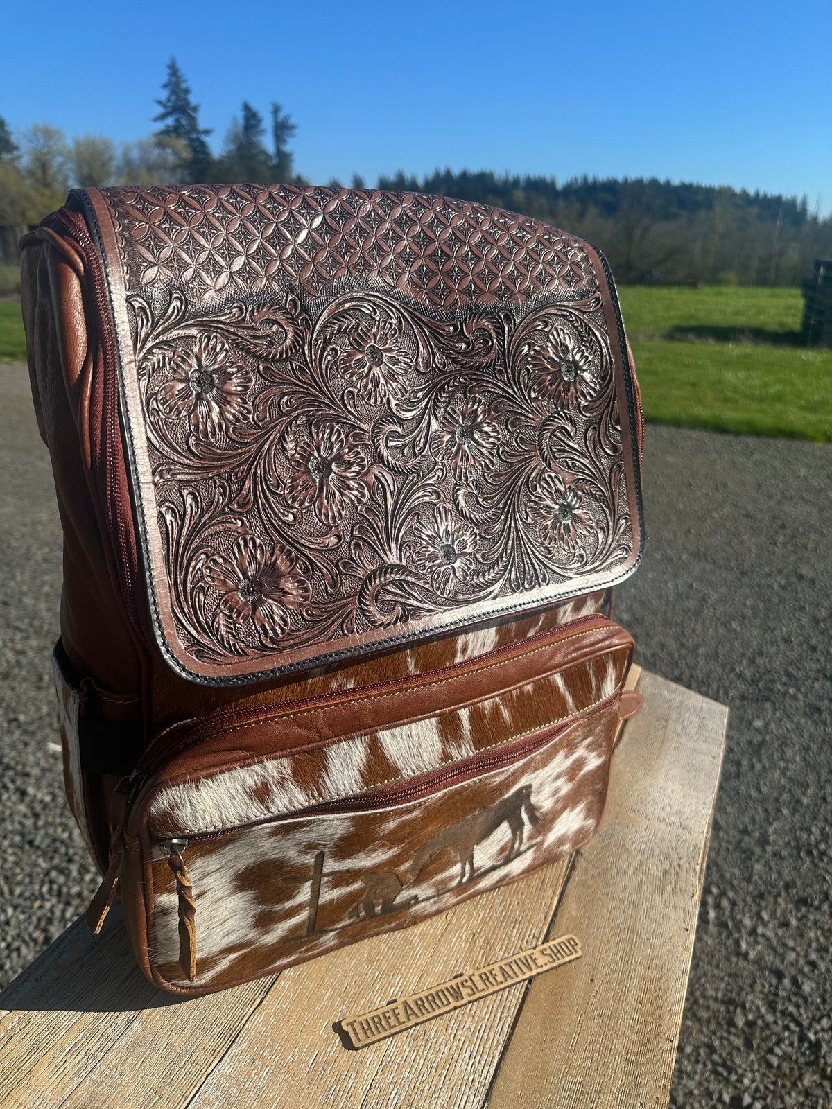 Leather and Cowhide Backpack with Praying Cowboy