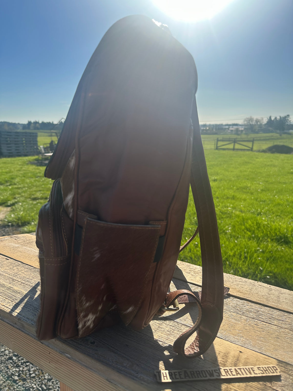Leather and Cowhide Backpack with Praying Cowboy